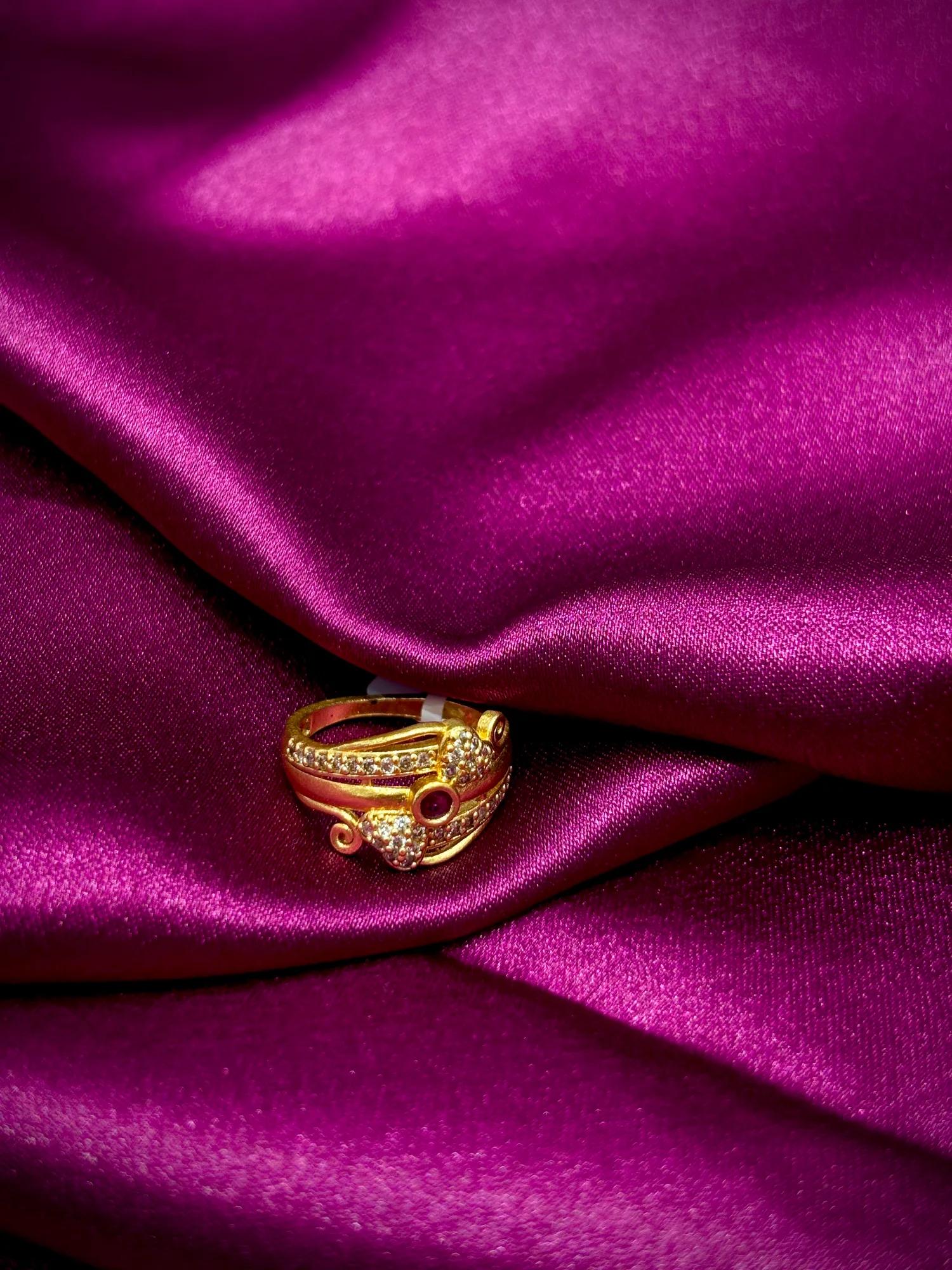 Elegant Gold-Tone CZ Floral Ring with Ruby Stone Accent