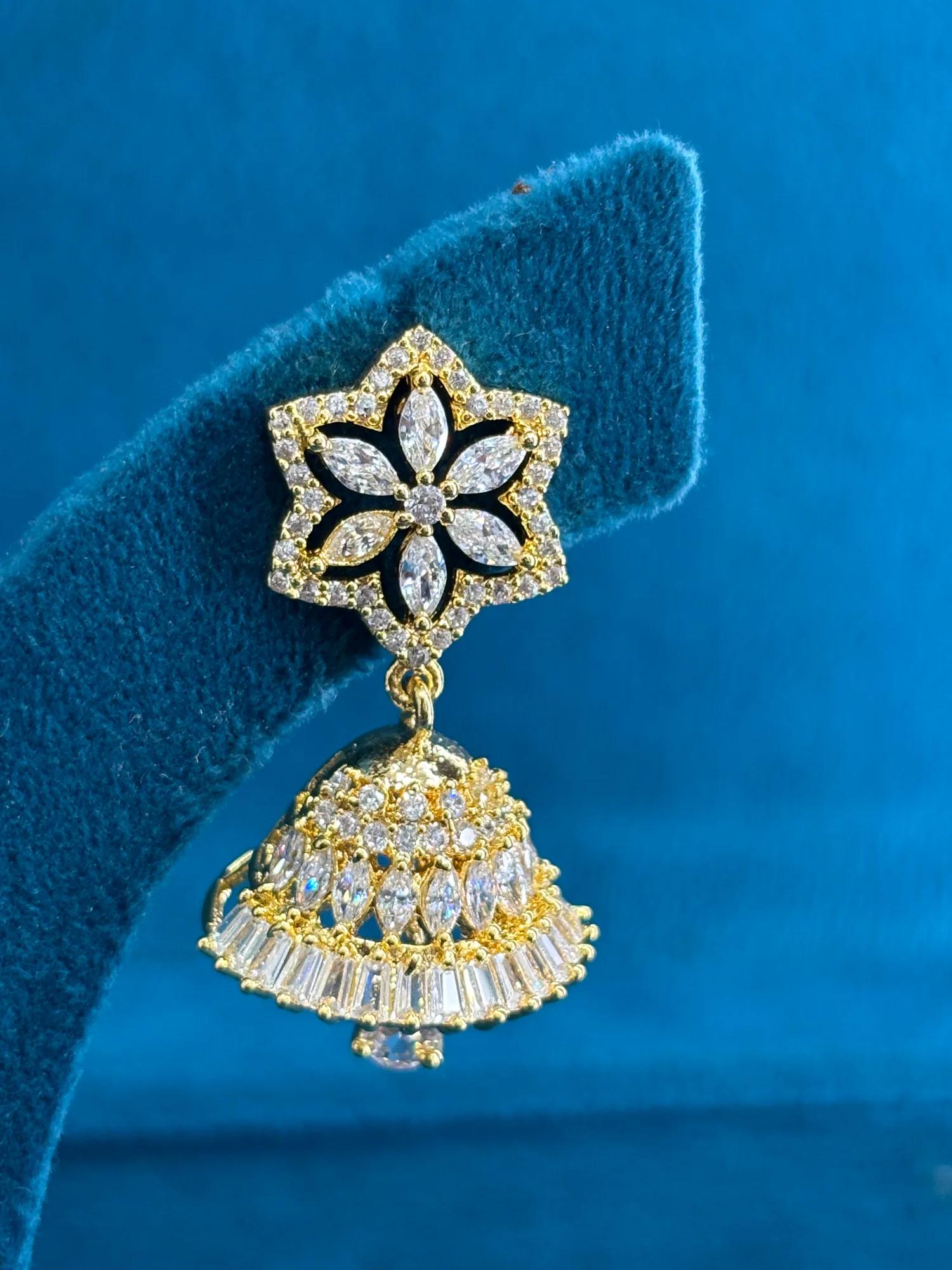 Elegant Gold-Plated Floral CZ Jhumka Earrings with Star Motif Studs