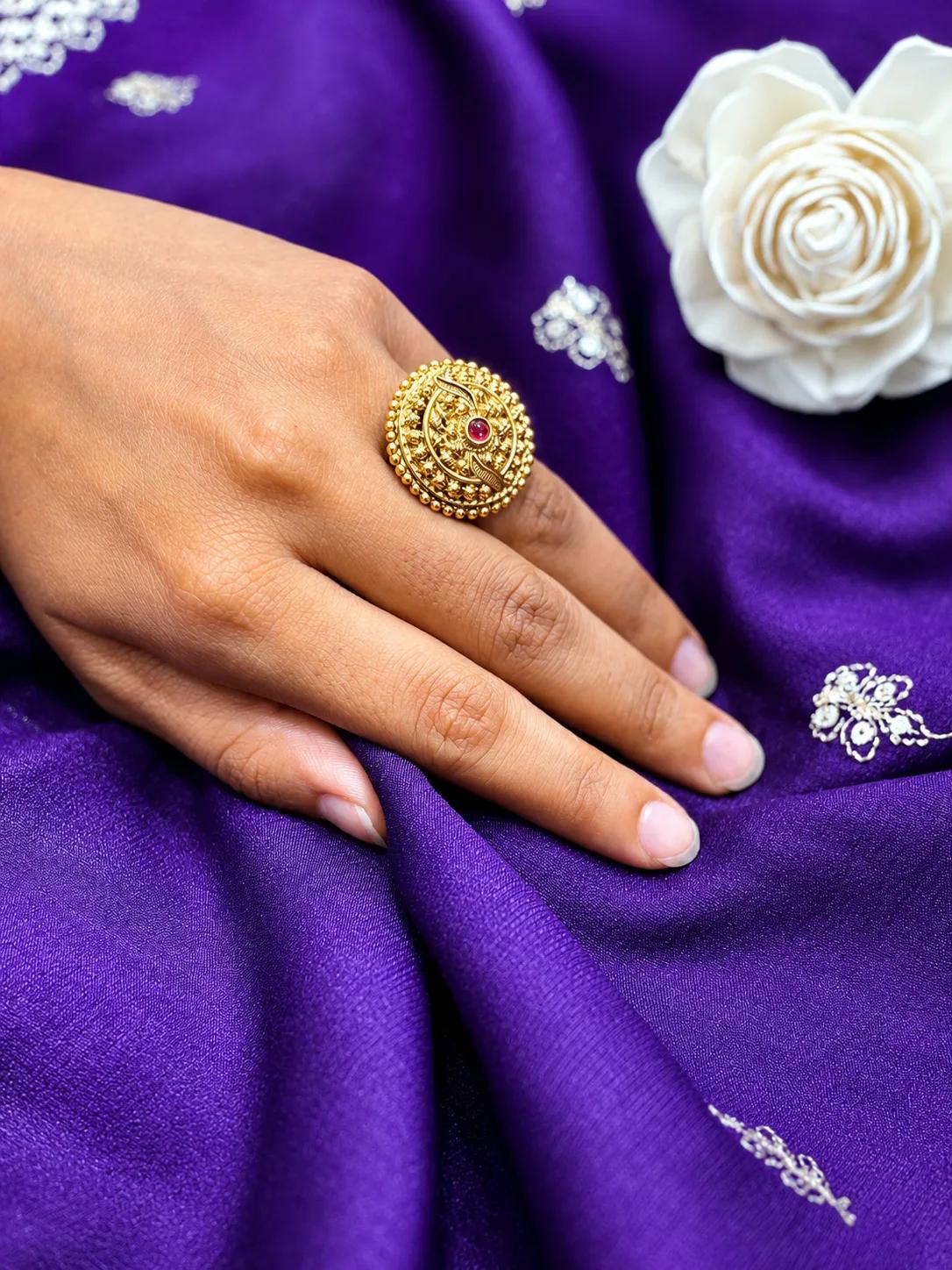 Traditional Gold Filigree Statement Ring with Ruby Accent